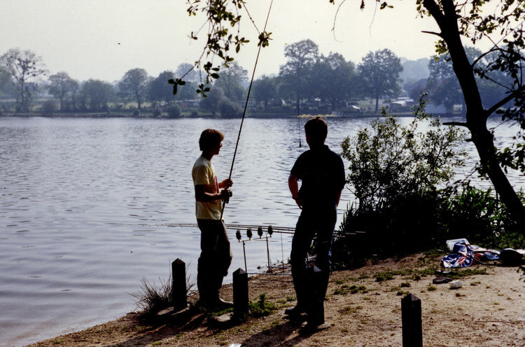 Ken Townley holding a large carp.