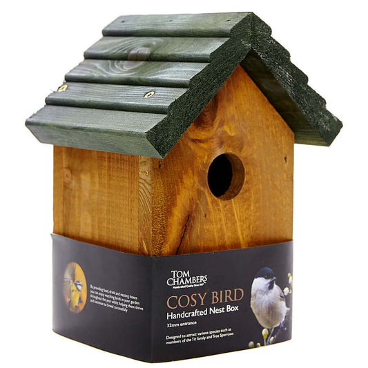 A sturdy, handcafted nest box with a rich wooden base and dark green roof.