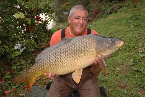 Image of Ken Townley holding a carp