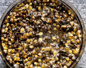 Photo of Buckwheat in a black bucket