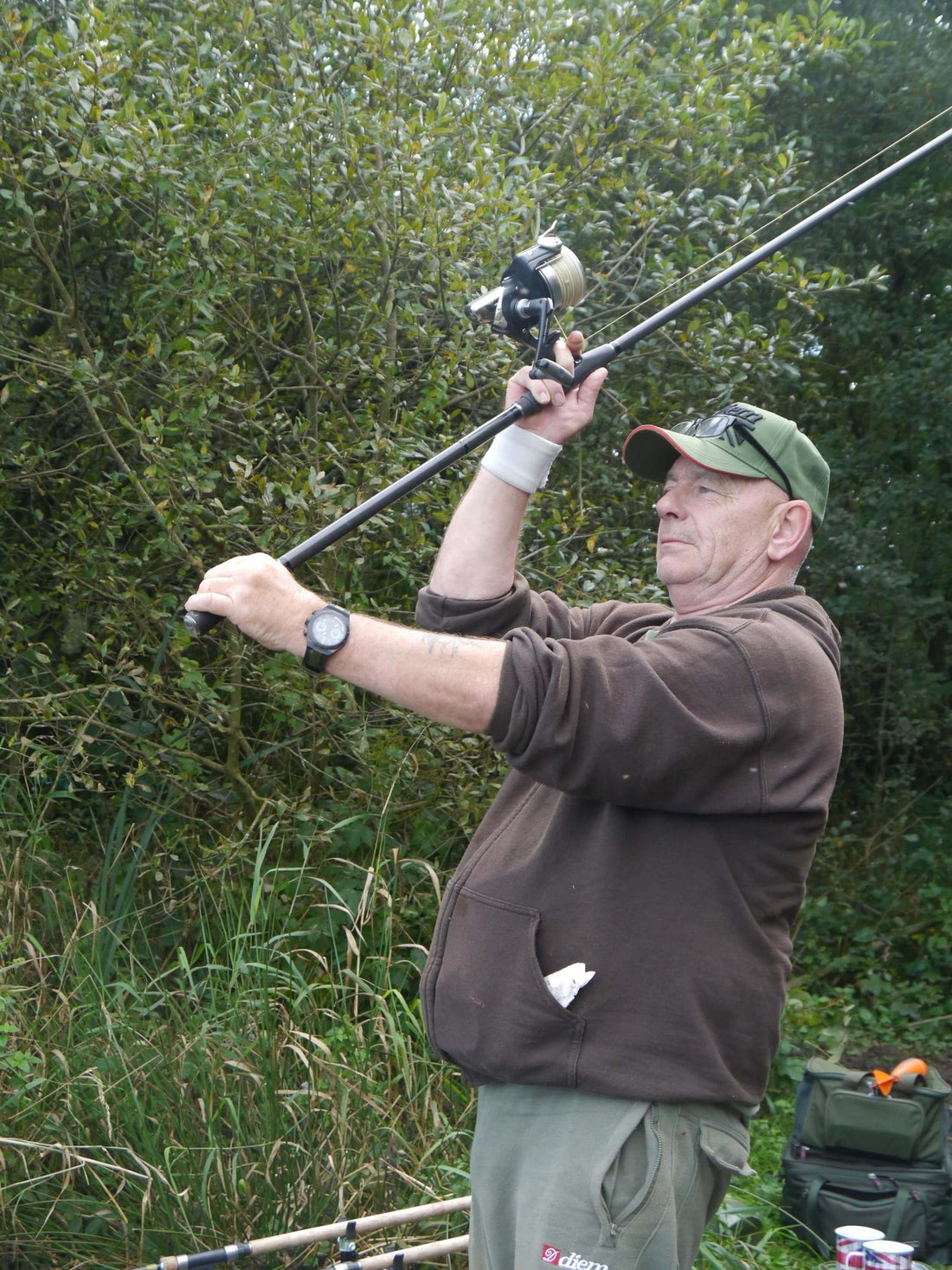 Adam Roots casting off on the lakeside