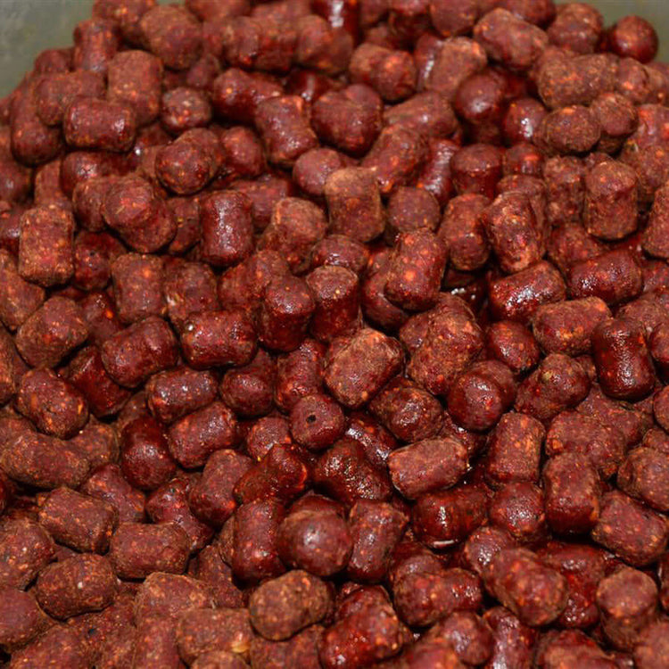 Dark brown-red chopped boilies. 