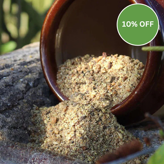 Brown container with ground substance on a stone surface, with a green discount label.