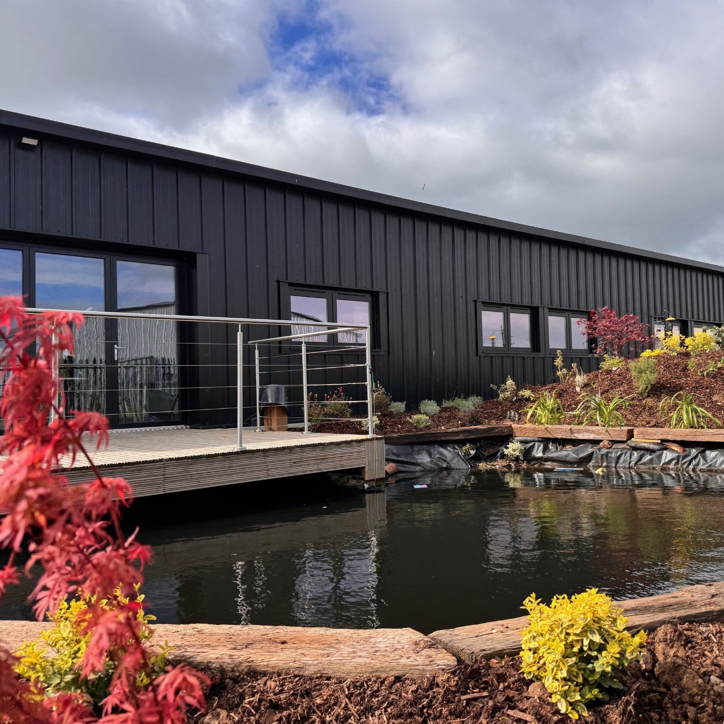 Haith's the bird food centre with pond and jetty 