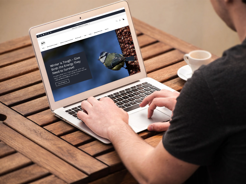 Haith's website displayed on a laptop
