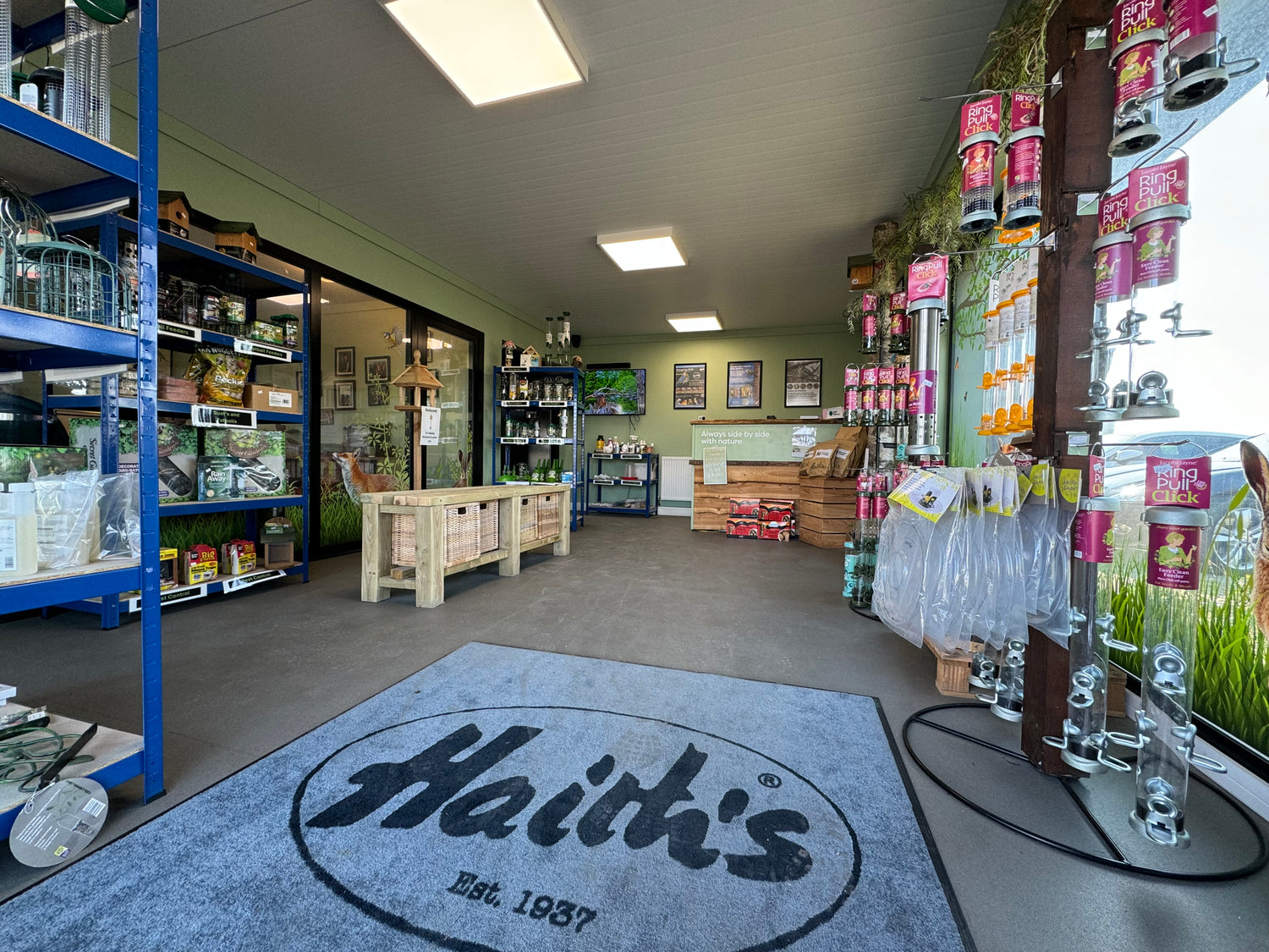 shop entrance showing feeders and till area