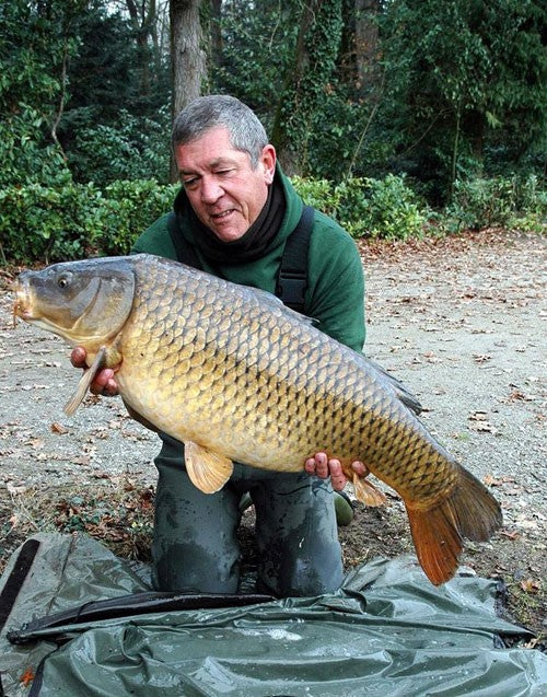 Ken Townley holding a carp