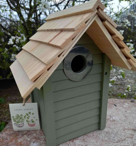Slated wooden roof on top of sturdy nest box, available from Haith's.