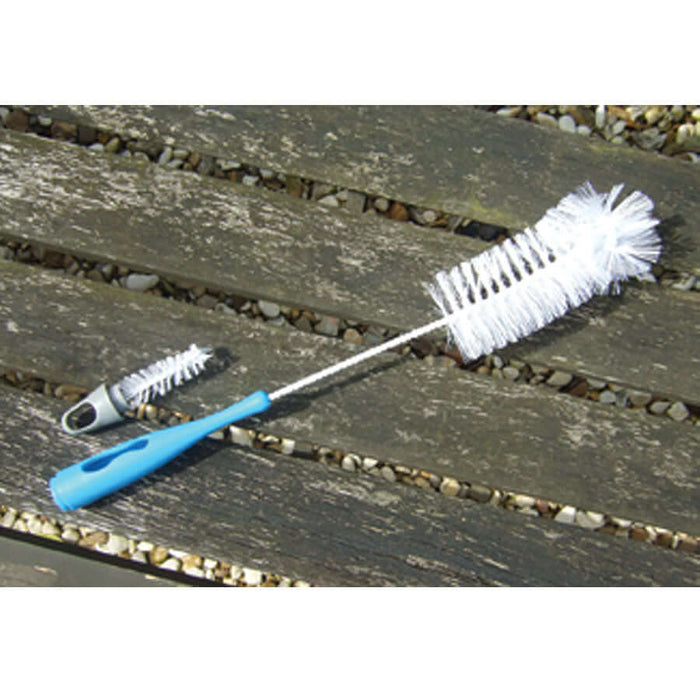 Brush for cleaning a bird feeder