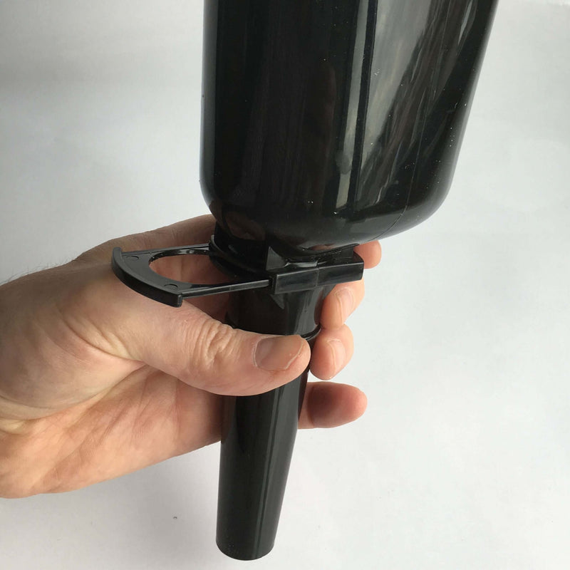 Scoop used to fill a garden bird feeder