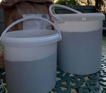 two buckets with lids