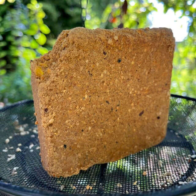 Hot Pepper Suet Cake on a mesh dish