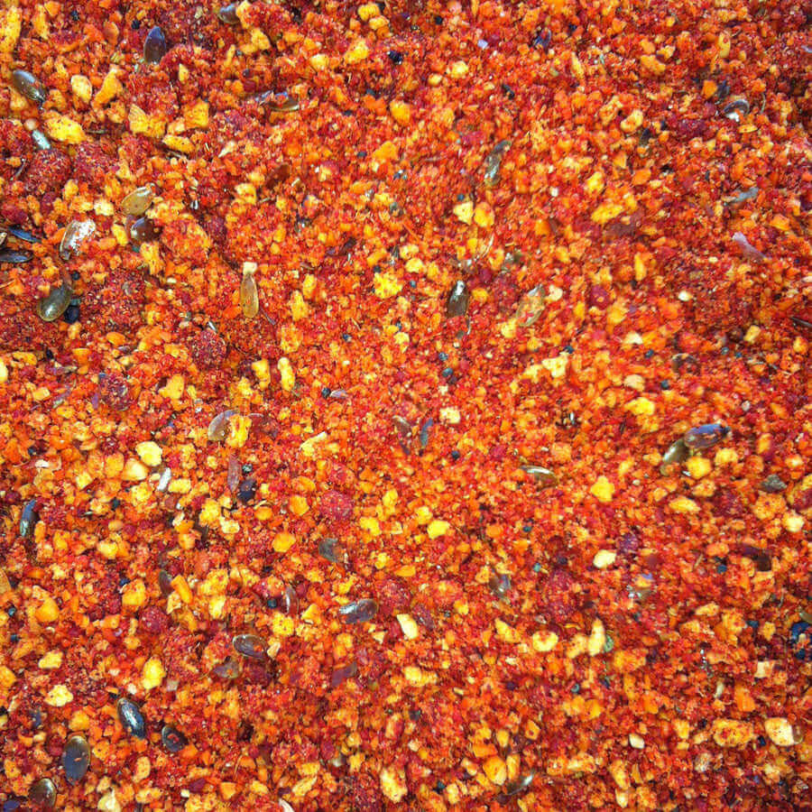A bright red and orange colour food mix for canaries, British finches and hybrids.
