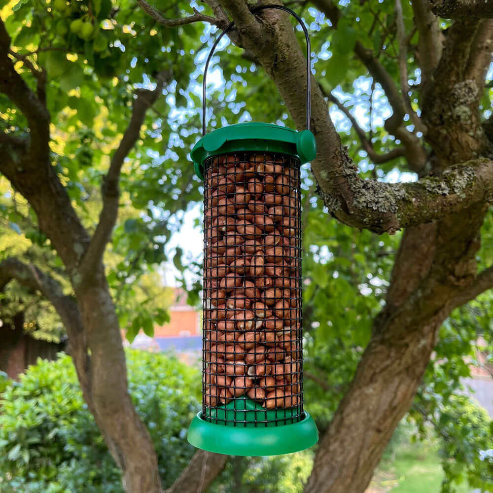 Attract more birds to your garden with this durable plastic FlipTop Peanut Feeder