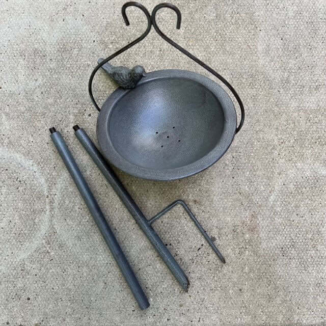 Metal feeding dish around 88cm in height, comes in three parts, spikes into the ground