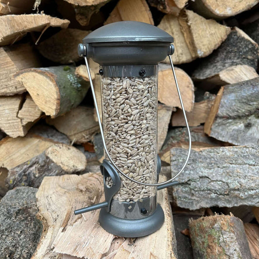 Hanging pewter metal seed feeder suitable for sunflower hearts