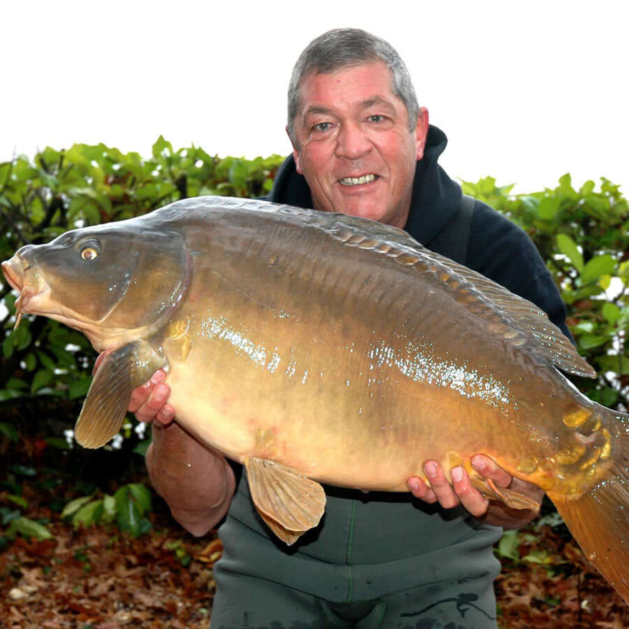 Ken Townley, with his carp caught using HoneyRed.