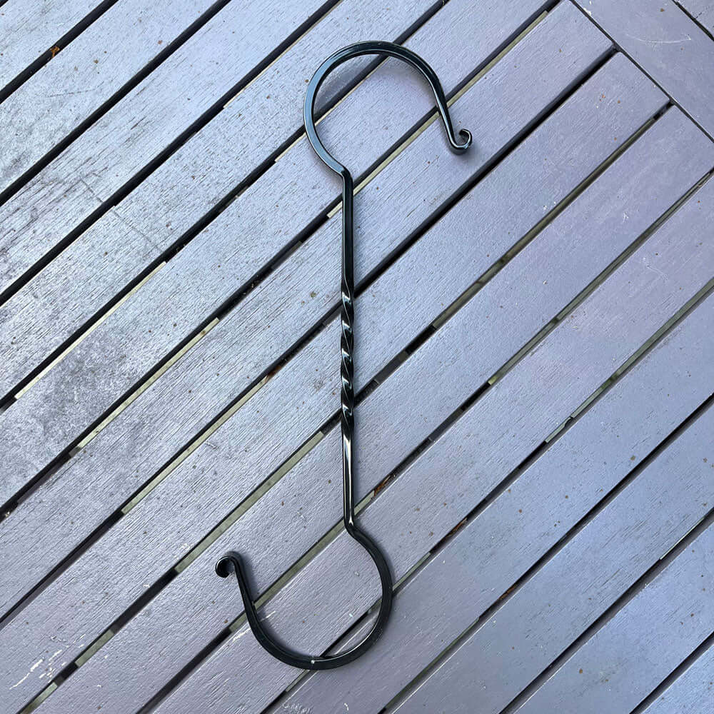 Metal sturdy hook made from durable materials to hang bird feeders from.
