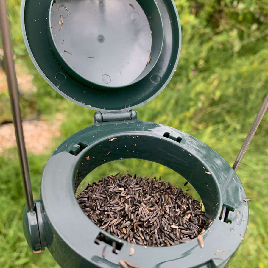 Niger seed feeder with easy to open flick and click lid and hanging loop